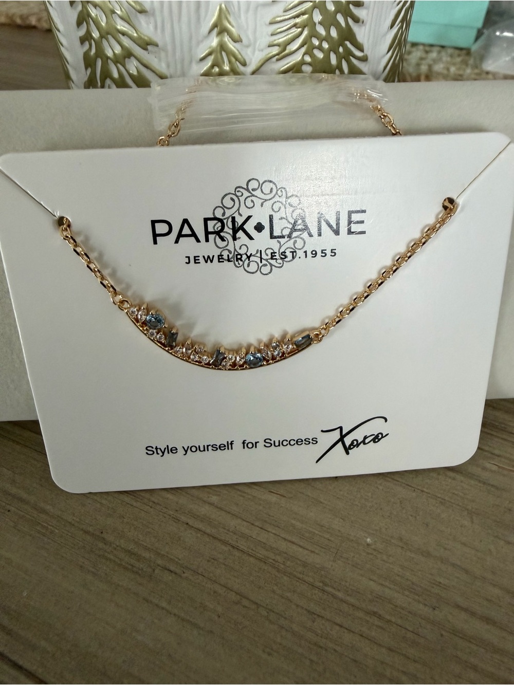 Park Lane Gold-Tone Curved Bar Necklace with Blue and Clear Stones